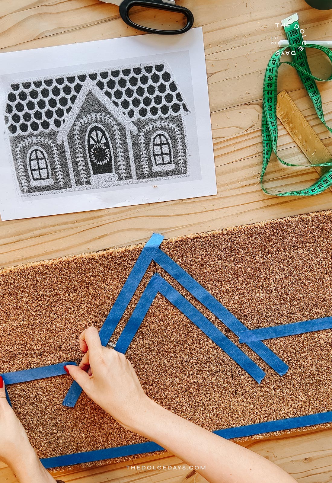 Marcando o capacho com fita crepe